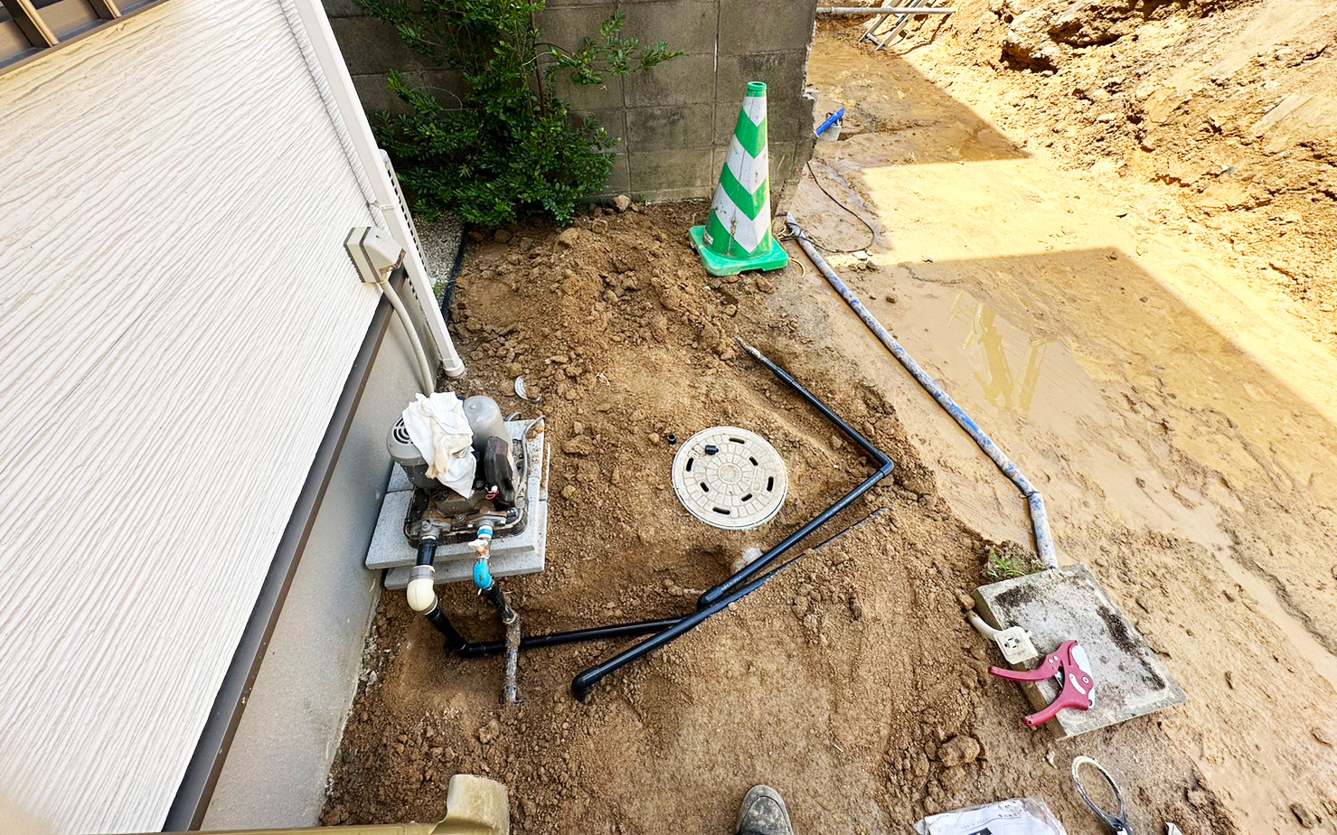 擁壁新設工事に伴い、井戸ポンプ移設工事：福岡市南区